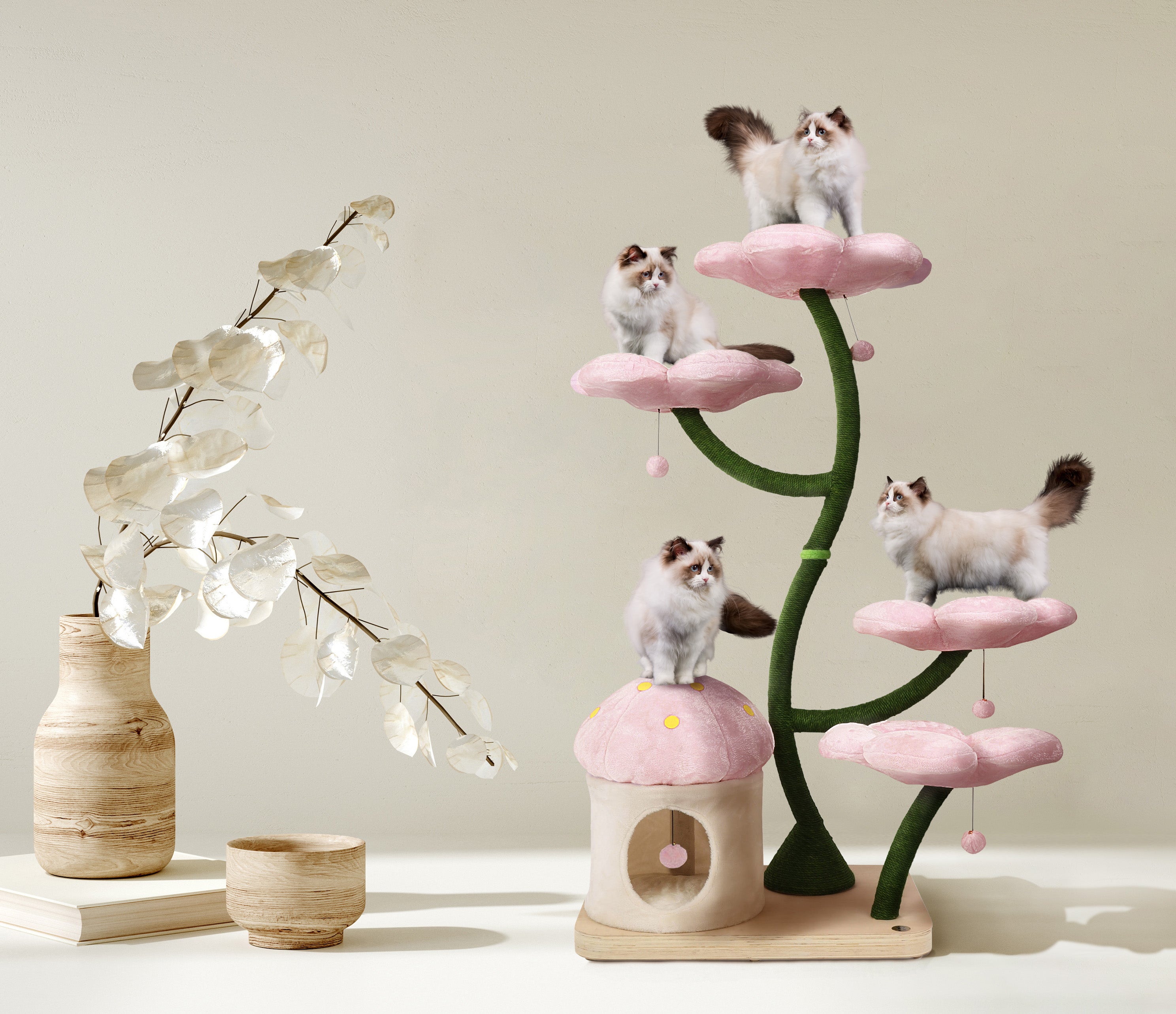 Three cats lounging on Cherry Blossom Eden, the ultimate floral cat tree